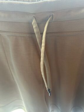 “Lululemonon” on back of pants. Tags. EUC. Tan color. 2 side pockets. See photos